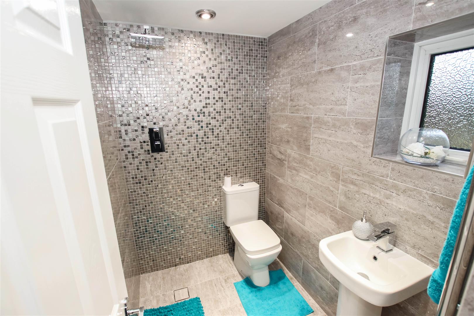 LUXURY FULLY TILED WET ROOM